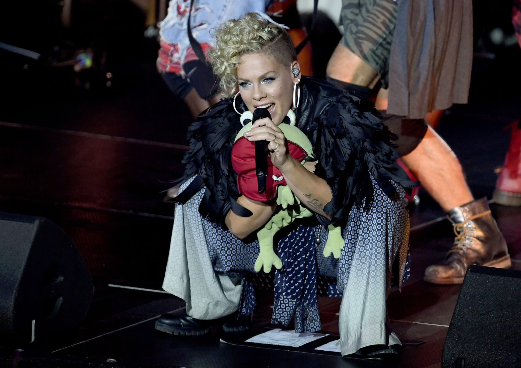 What color will Pink's hair be when she starts to sing the national anthem?